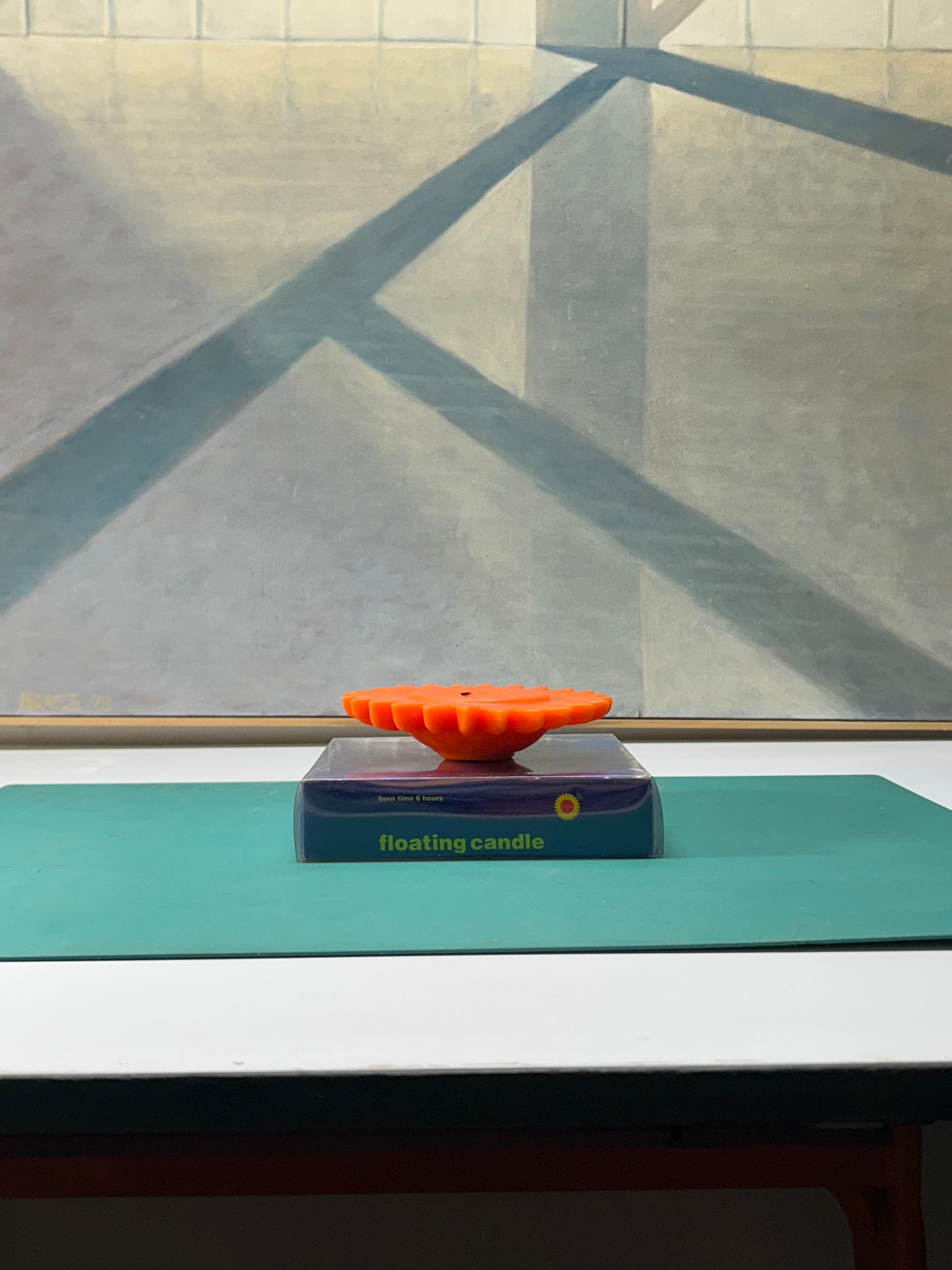 Orange floating candle 6 hour burn time