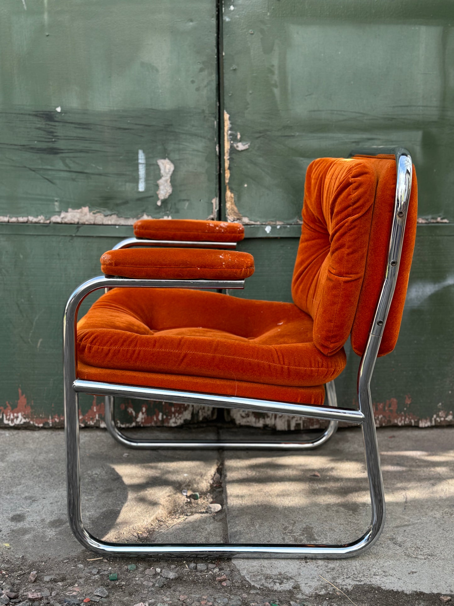 1970s tubular chrome and orange velvet lounge chair