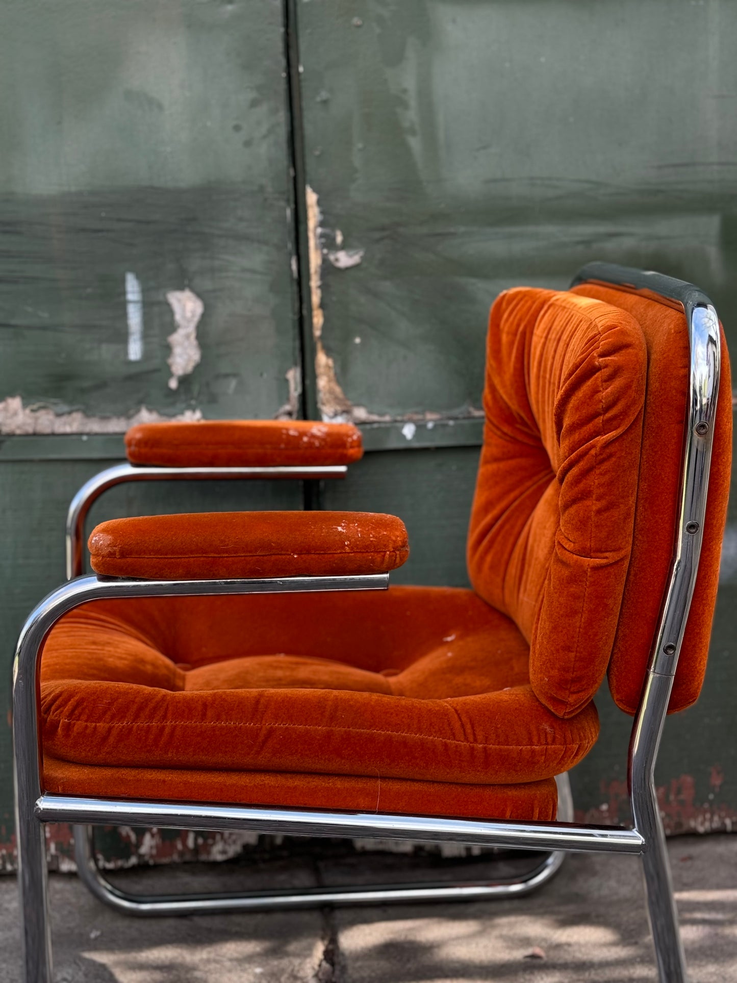 1970s tubular chrome and orange velvet lounge chair