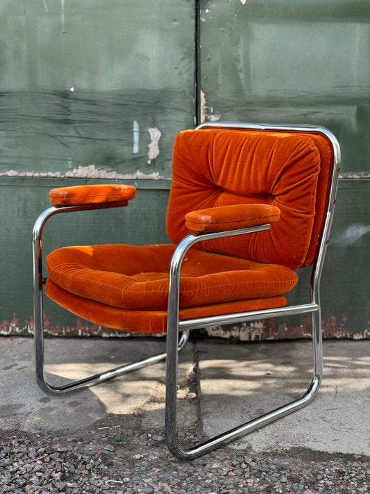 1970s tubular chrome and orange velvet lounge chair