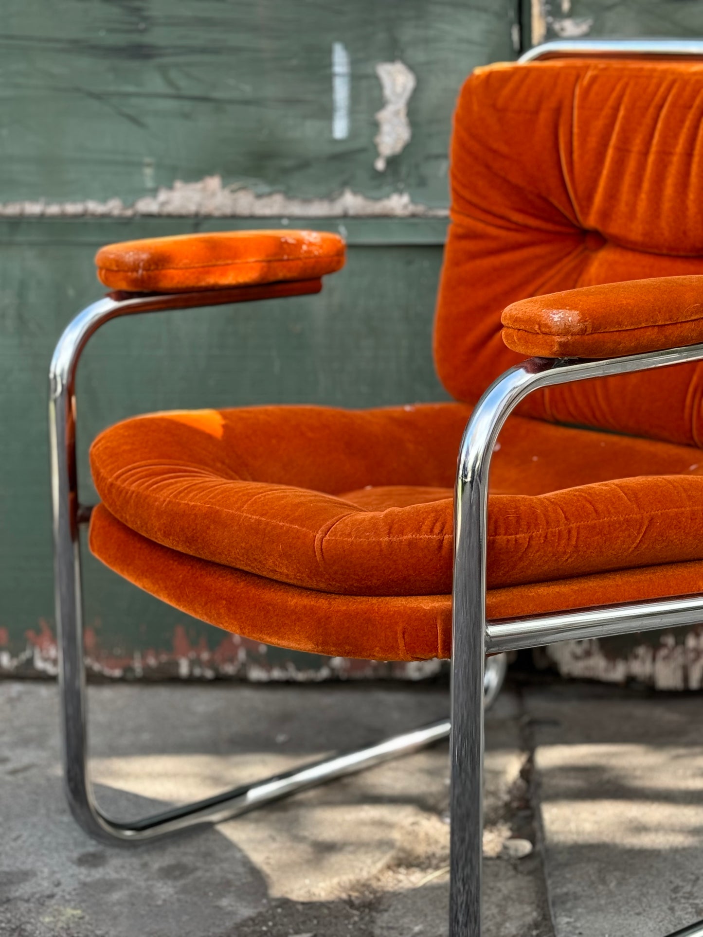 1970s tubular chrome and orange velvet lounge chair